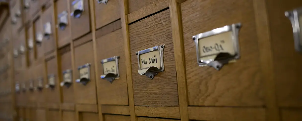 Library card catalog drawers with metal label holders