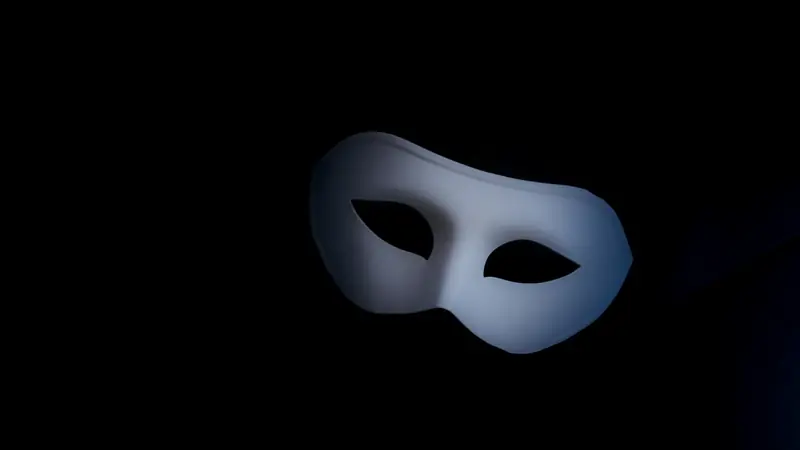 A white mask on a black background